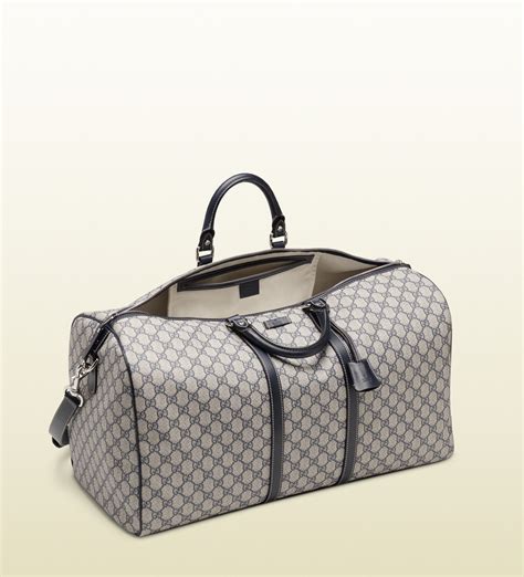 gucci carry on bag.